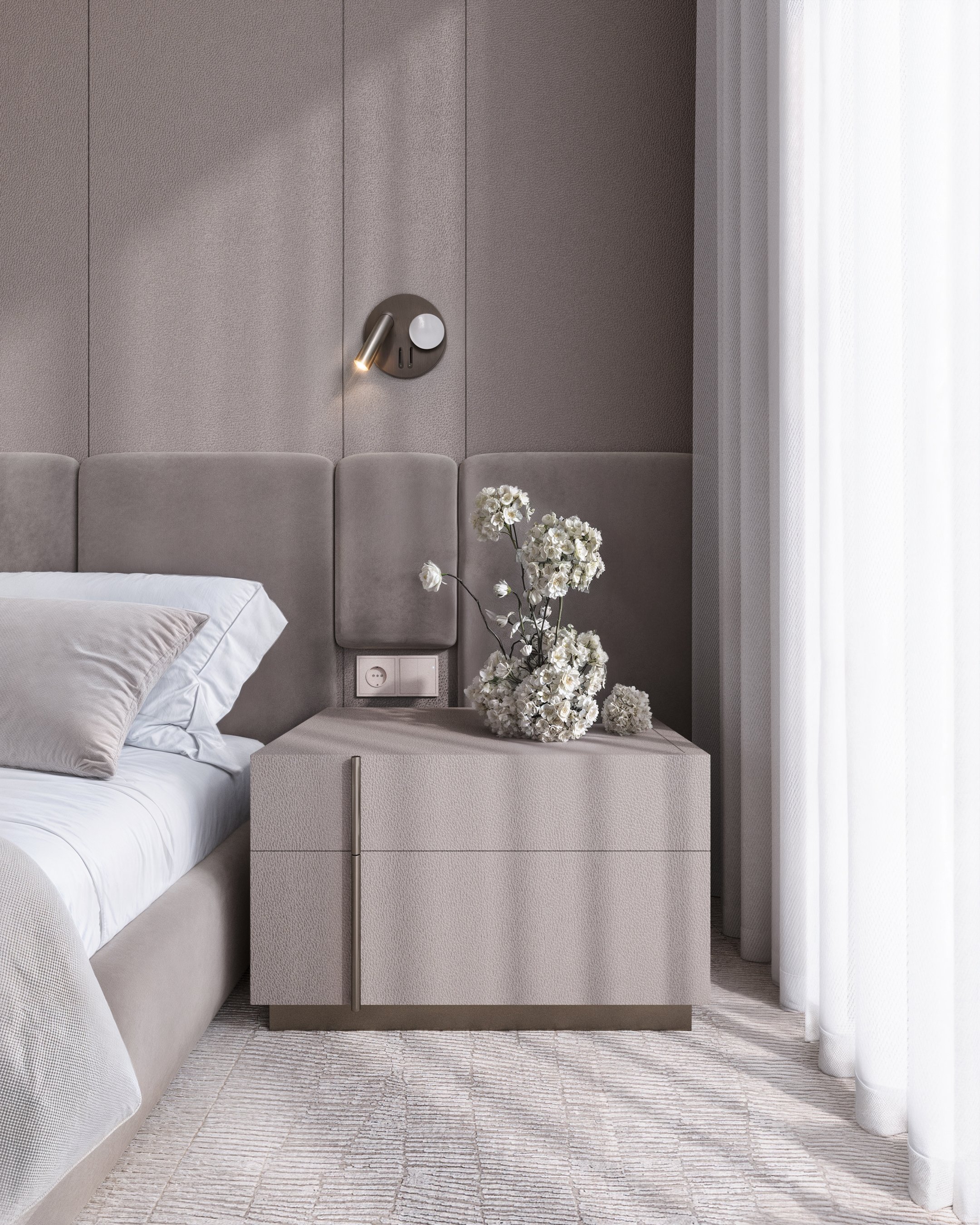 Bedroom nightstand detail with sculptural lighting.