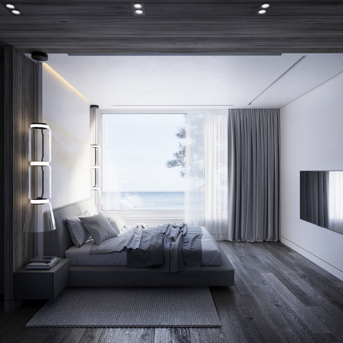 Bedroom with a large window facing the water.