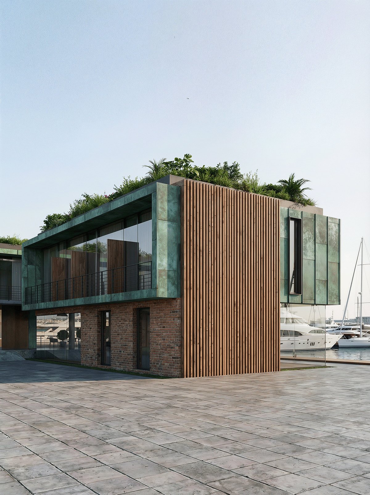 Exterior courtyard with stone paving and timber and glass facade.