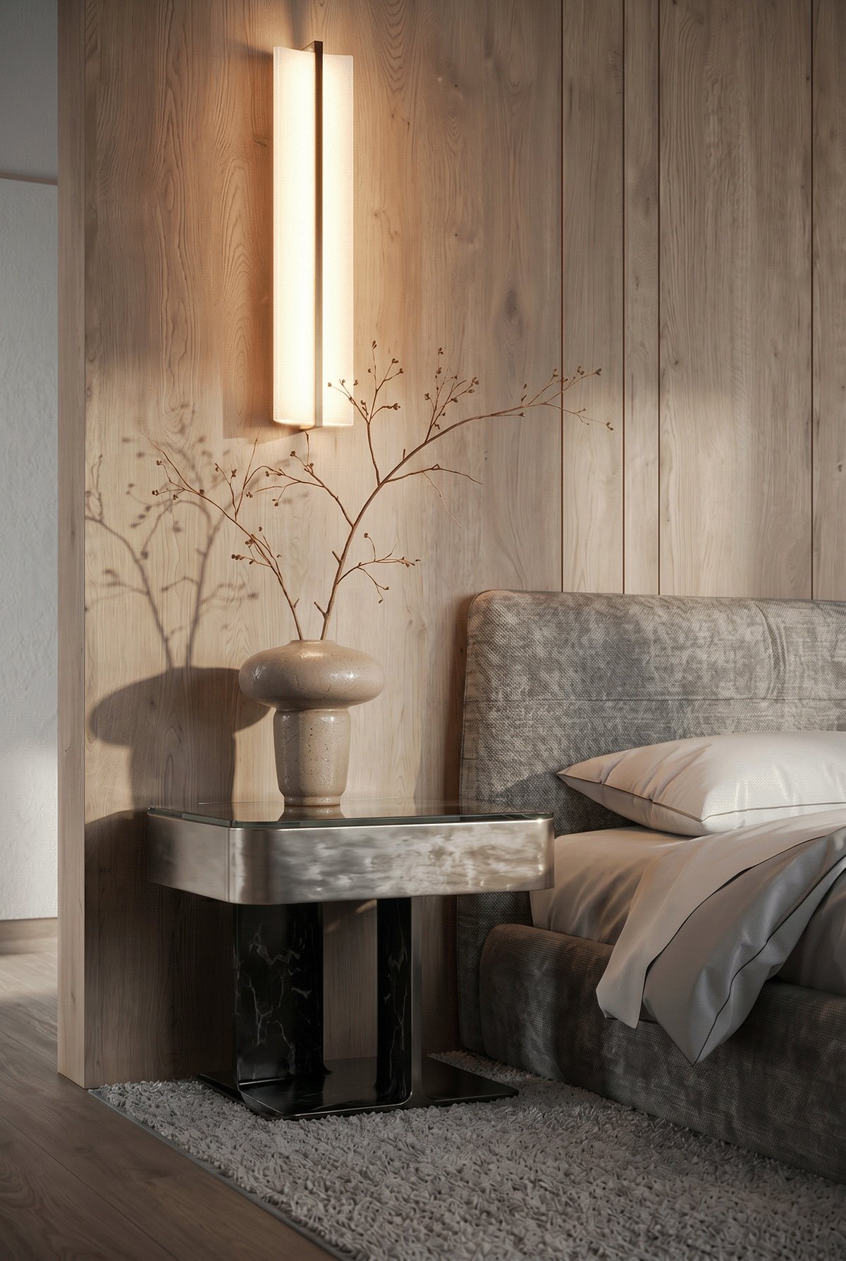 Bedroom detail with a wall sconce and bench.
