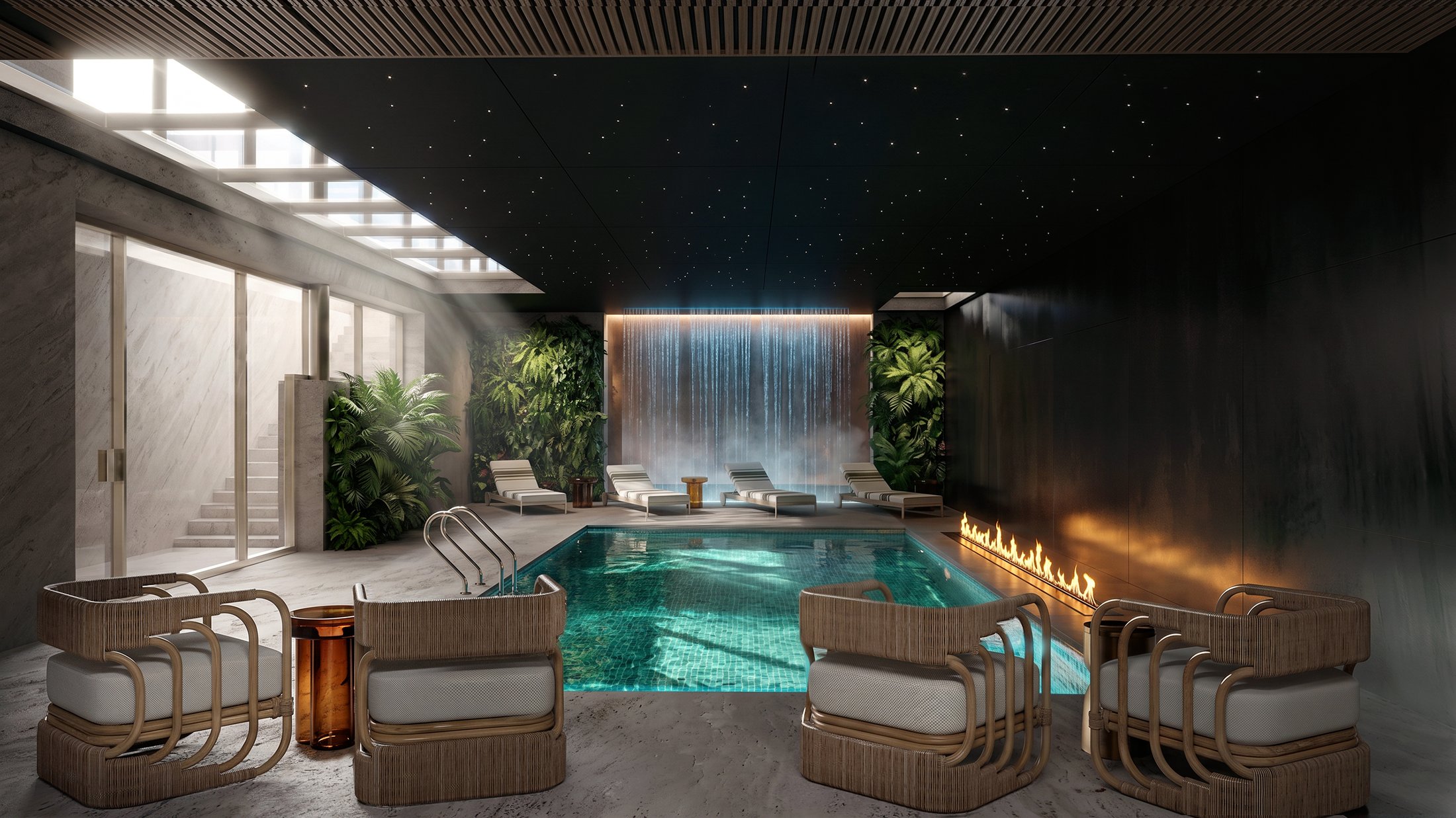 Indoor pool with a star-lit ceiling and loungers.